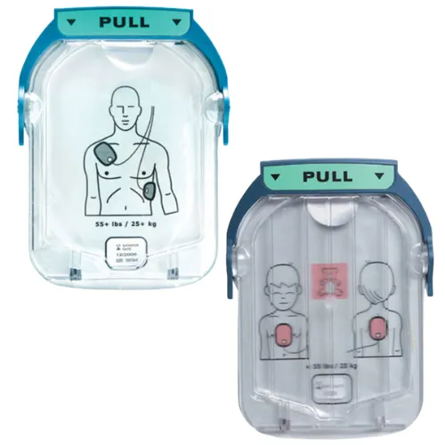 Philips HeartStart HS1 SMART Pads Erwachsene 2 Durchsichtige Einmal-Elektrodenpads für Erwachsene mit Grafik auf der Vorderseite.